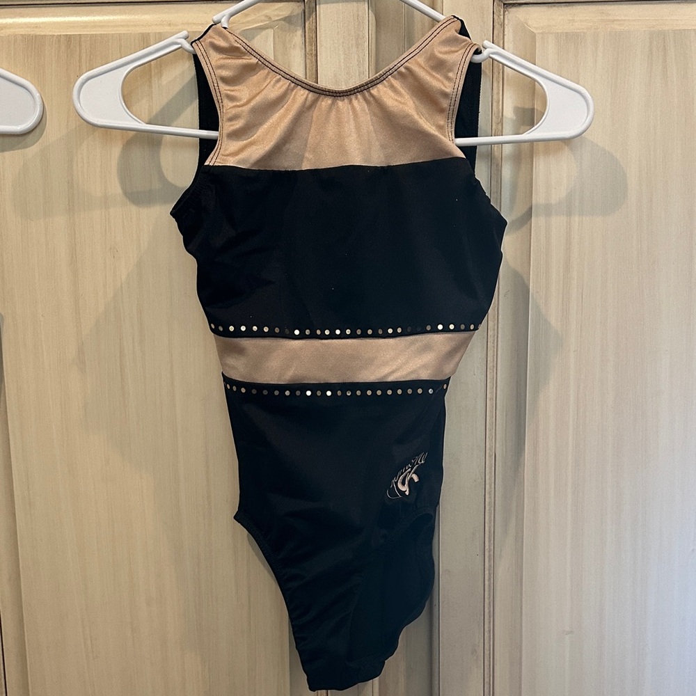 GK Simone EUC Black and Gold Kids One Piece fits like size 10